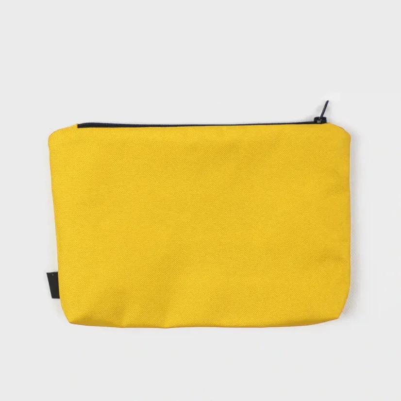 Pohľad na žltú kapsičku zozadu