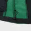 Detail sťahovacej gumičky na spodnom okraji Detail sťahovacej gumičky na spodnom okraji